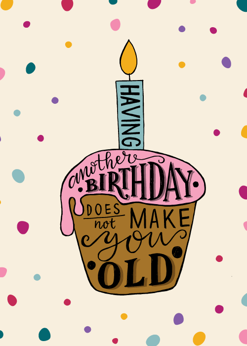 Hand-lettered illustrated cupcake with pink frosting and a lit candle with the text Having Another Birthday Does Not Make You Old layered across it, surrounded by colorful polka dots on a cream background